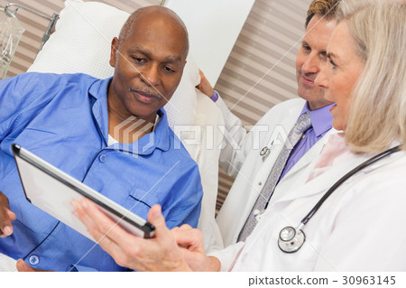 Senior African American Patient in Hospital Bed Senior African American Patient in Hospital Bed 30963145