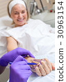 Plastic Surgeon Doctor Marks Hand of Senior Woman 30963154