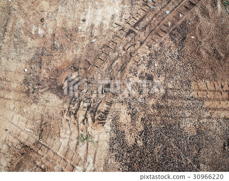 Wheel tracks on the soil 30966220