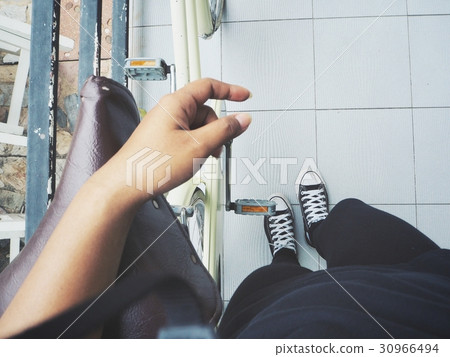 Selfie of bicycle with shoes 30966494
