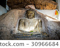 Old buddha image on the rock. 30966684