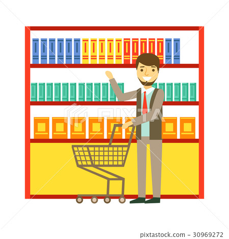Man shopping at supermarket with shopping cart and 30969272