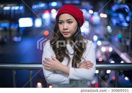 Lonely asian woman, outdoor in night Lonely asian woman, outdoor in night 30969501