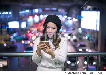 Outdoor portrait of beautiful young asian woman Outdoor portrait of beautiful young asian woman 30969506