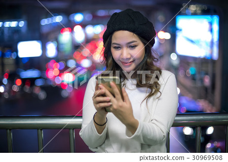 Outdoor portrait of beautiful young asian woman Outdoor portrait of beautiful young asian woman 30969508