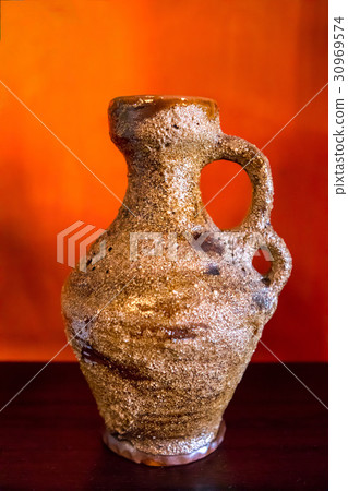 Antique vase on the table 30969574