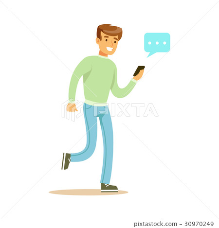 Young man walking and sending a message to someone Young man walking and sending a message to someone 30970249