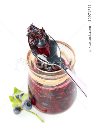 Fresh blueberry homemade jam on white background Fresh blueberry homemade jam on white background 30971751