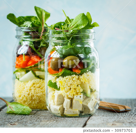 Colorful salad with couscous, tofu and vegetables  30973701