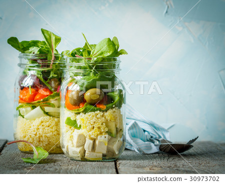 Colorful salad with couscous, tofu and vegetables  30973702