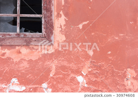 Broken window with old red wall 30974608