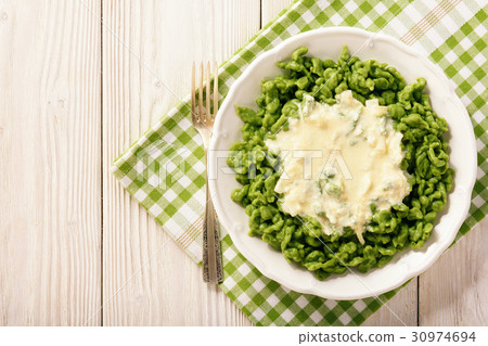 German dumplings (spaetzle)with spinach and cheese German dumplings (spaetzle)with spinach and cheese 30974694