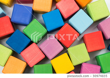 Flat lay of colorful wooden cubes Flat lay of colorful wooden cubes 30974835