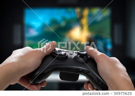 Gaming game play video on tv or monitor. Gaming game play video on tv or monitor. 30975620
