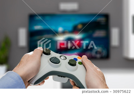 Gaming game play video on tv. Gamer concept. 30975622