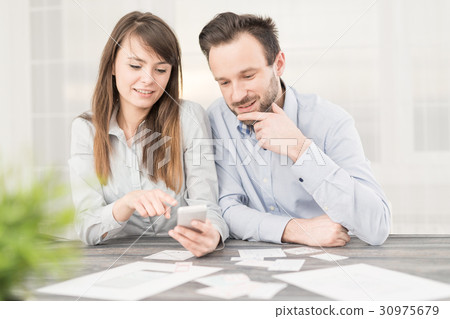 Designers drawing website ux app development. 30975679