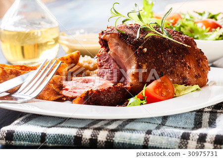 Pork knuckle with fried sauerkraut 30975731