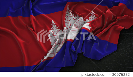 Cambodia Flag Wrinkled On Dark Background Cambodia Flag Wrinkled On Dark Background 30976282