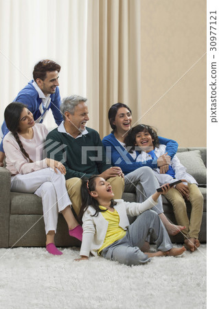 Happy multi generation family watching television 30977121