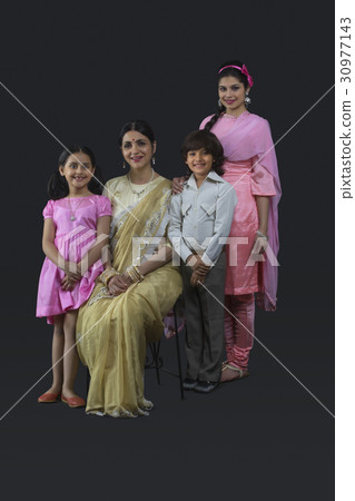 Portrait of Indian three generation family dressed in retro style 30977143