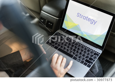 Hands working on laptop network graphic overlay 30977873