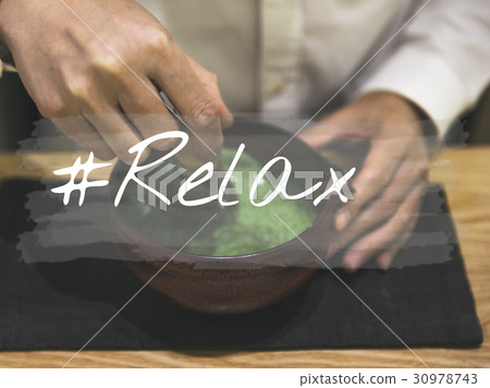 Hands with Japanese Traditional Green Tea 30978743
