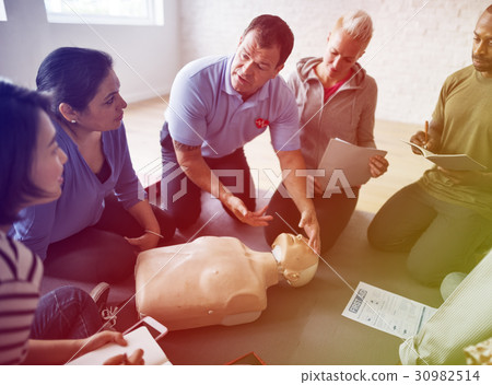 Group of people CPR First Aid training course Group of people CPR First Aid training course 30982514