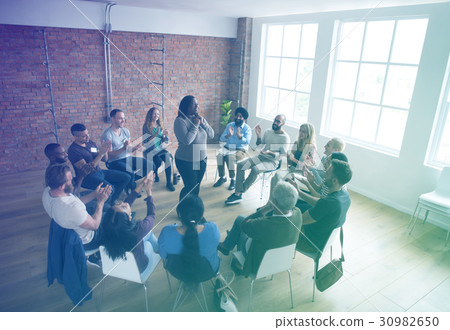 People attending a seminar with professional People attending a seminar with professional 30982650