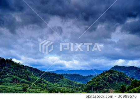 Rural view of mountain with raincloud 30989676