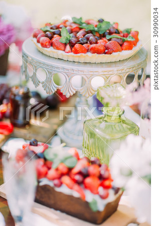 The close-up photo of the wedding sponge cake with 30990034