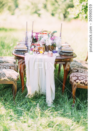The close-up photo of the wedding setting table 30990059