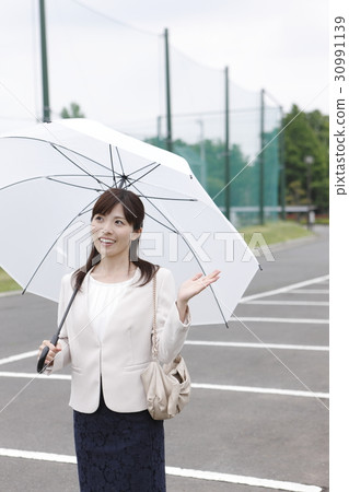 Business woman image in the rainy season Business woman image in the rainy season 30991139
