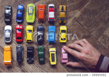 assorted colorful car collection on floor assorted colorful car collection on floor 30995091