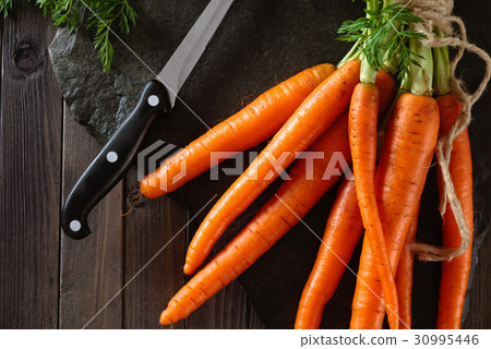 Heap of ripe carrots. Heap of ripe carrots. 30995446