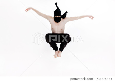 Ninja on white background. Male fighter in black Ninja on white background. Male fighter in black 30995873
