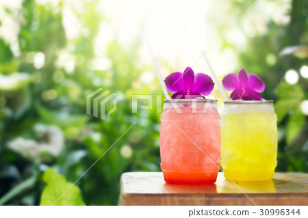 Colorful cool drink in summer on nature background Colorful cool drink in summer on nature background 30996344