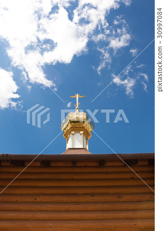 The dome of the Orthodox chapel against blue sky 30997084