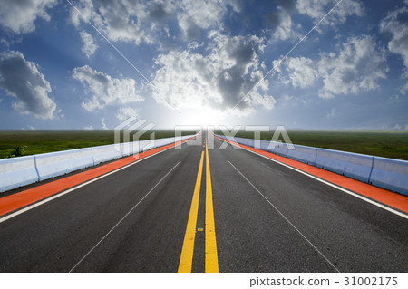 Empty road and the yellow traffic lines 31002175