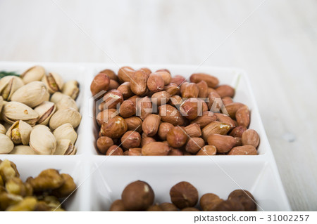 Nuts in a plate Nuts in a plate 31002257