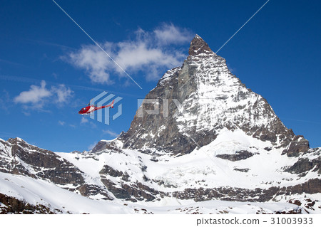 Helicopter next to Matterhorn Helicopter next to Matterhorn 31003933