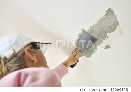 Woman with Scraping Tool 31004108