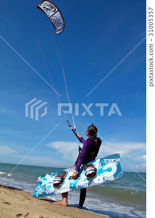 kitesurfer and his kite at sky background 31005357
