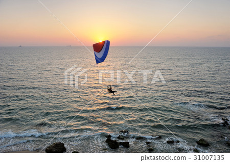 Powered paraglider flying 31007135
