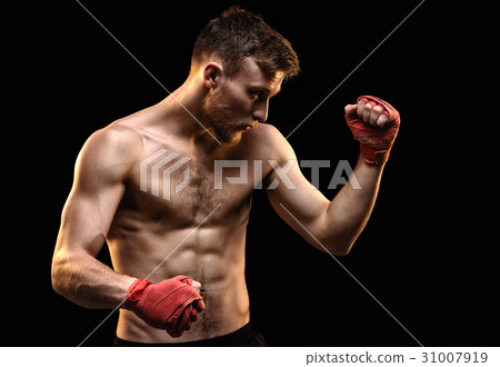 Bearded athlete with boxing bandages Bearded athlete with boxing bandages 31007919