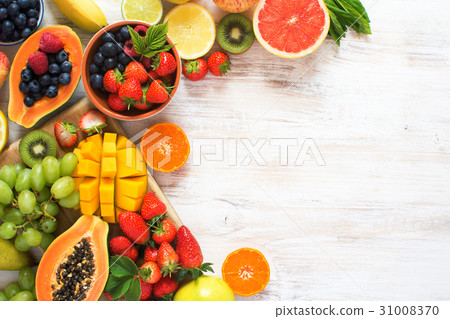 Rainbow fruits top view on white Rainbow fruits top view on white 31008370