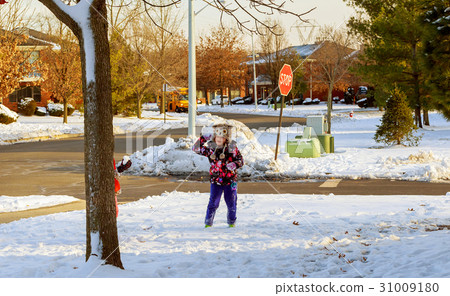 girl walking around outdoors in the winter 31009180