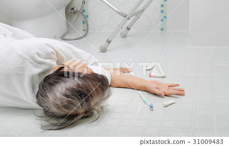 Elderly woman falling in bathroom Elderly woman falling in bathroom 31009483