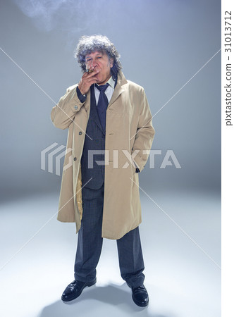 The senior man with cigar as detective or boss of The senior man with cigar as detective or boss of 31013712