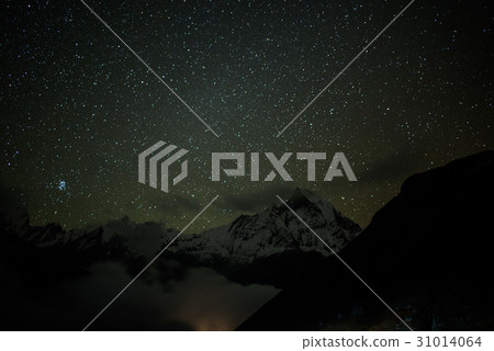 Mt.Machapuchare in the night ,gain and soft focus Mt.Machapuchare in the night ,gain and soft focus 31014064