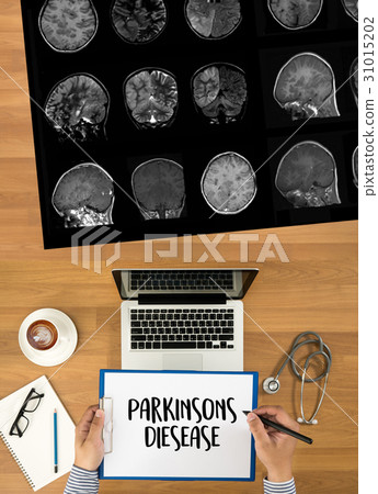 Parkinsons Disease doctor hand working doctor Parkinsons Disease doctor hand working doctor 31015202